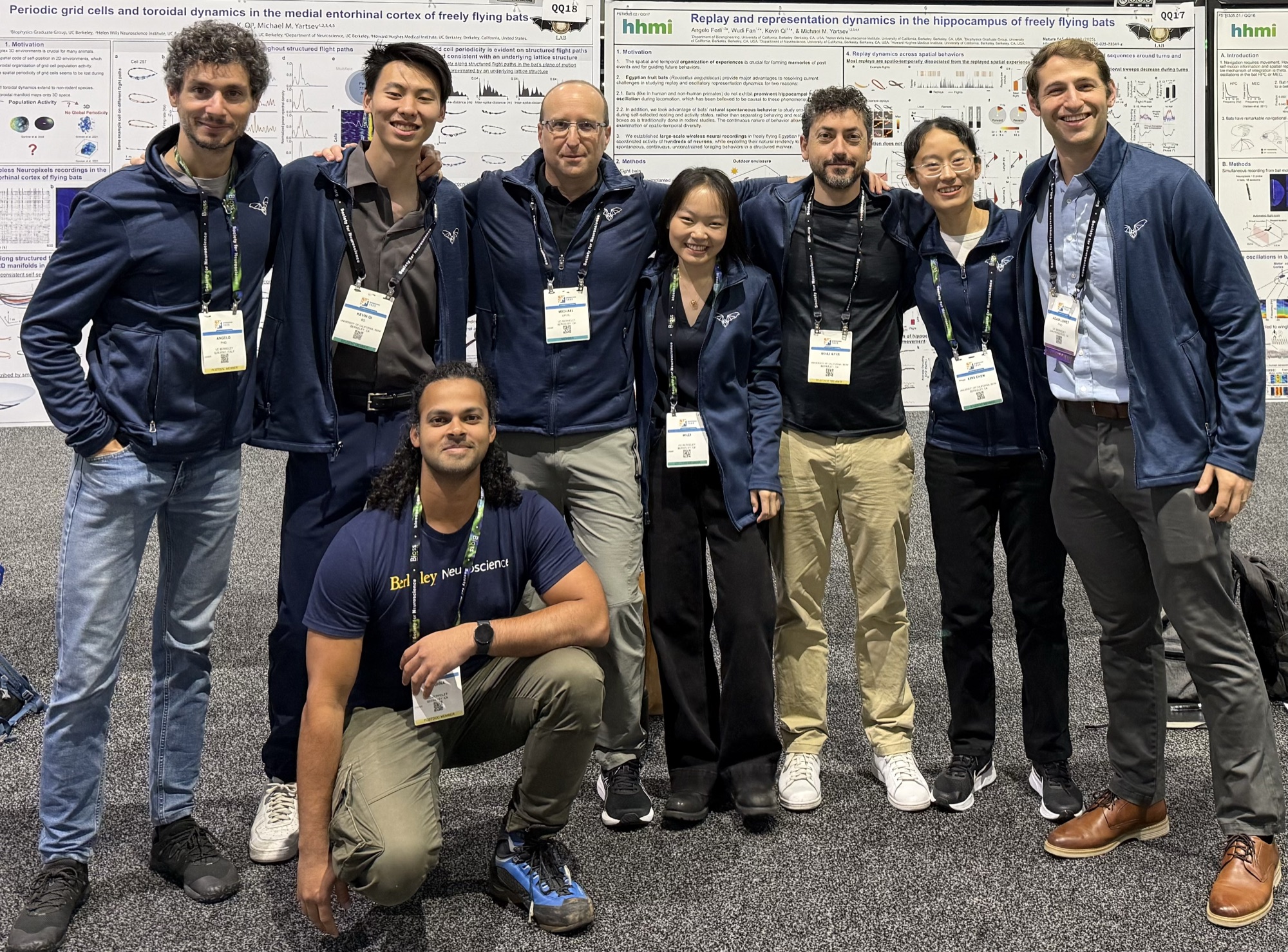 The NeuroBat Lab team together in front of their posters at SfN 2025